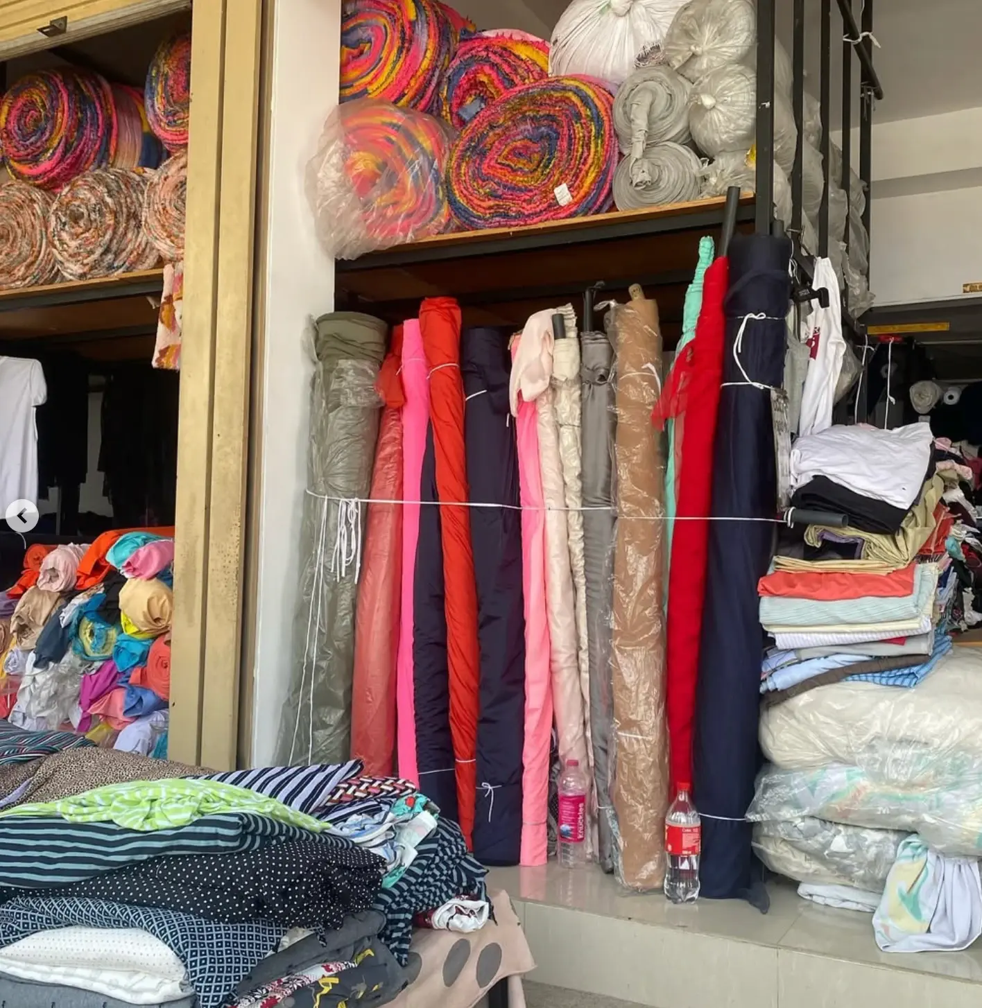 Rolls of deadstock fabric sourced from a Sri Lankan textile market