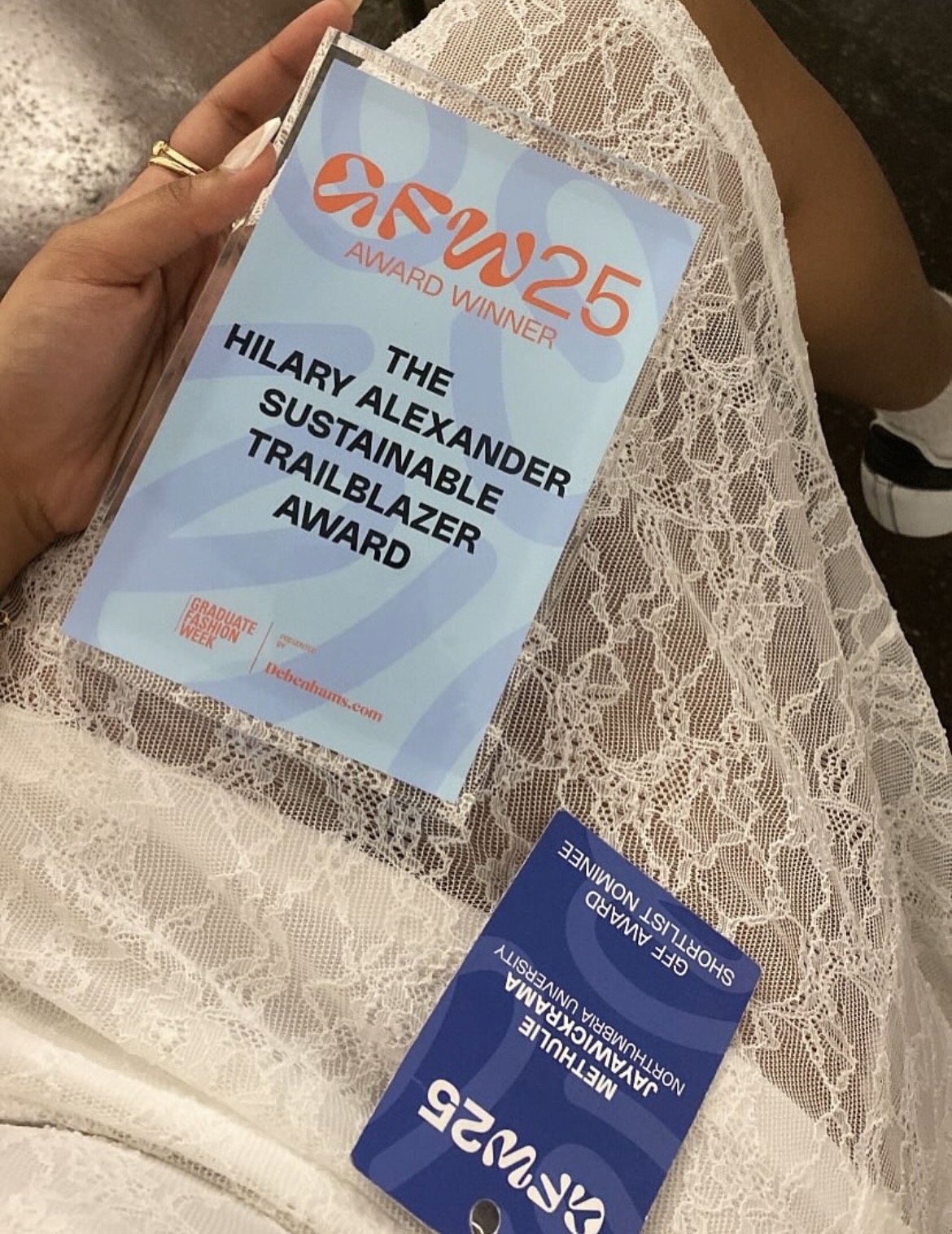 Hilary Alexander Sustainable Trailblazer Award certificate held in hand
